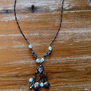 Silver and pearl locket